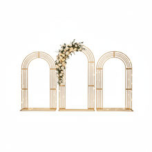 Load image into Gallery viewer, Gold metal wedding arch backdrop with curved geometric design for ceremony decor