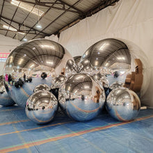 Load image into Gallery viewer, Silver inflatable mirror balls creating stunning disco ball effect at birthday party celebration