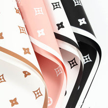 Load image into Gallery viewer, Waterproof flower wrapping paper sheets in clear OPP material for birthday bouquets