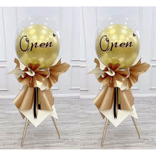 Load image into Gallery viewer, Golden balloon stand for a birthday party
