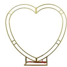 Load image into Gallery viewer, White metal heart-shaped wedding arch backdrop stand with floral decorations for ceremony