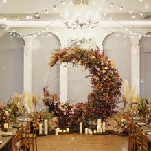 Load image into Gallery viewer, Floral decorated moon shaped arch backdrop for bridal shower and wedding events