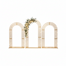Load image into Gallery viewer, Gold metal wedding arch backdrop with curved geometric design for ceremony decor
