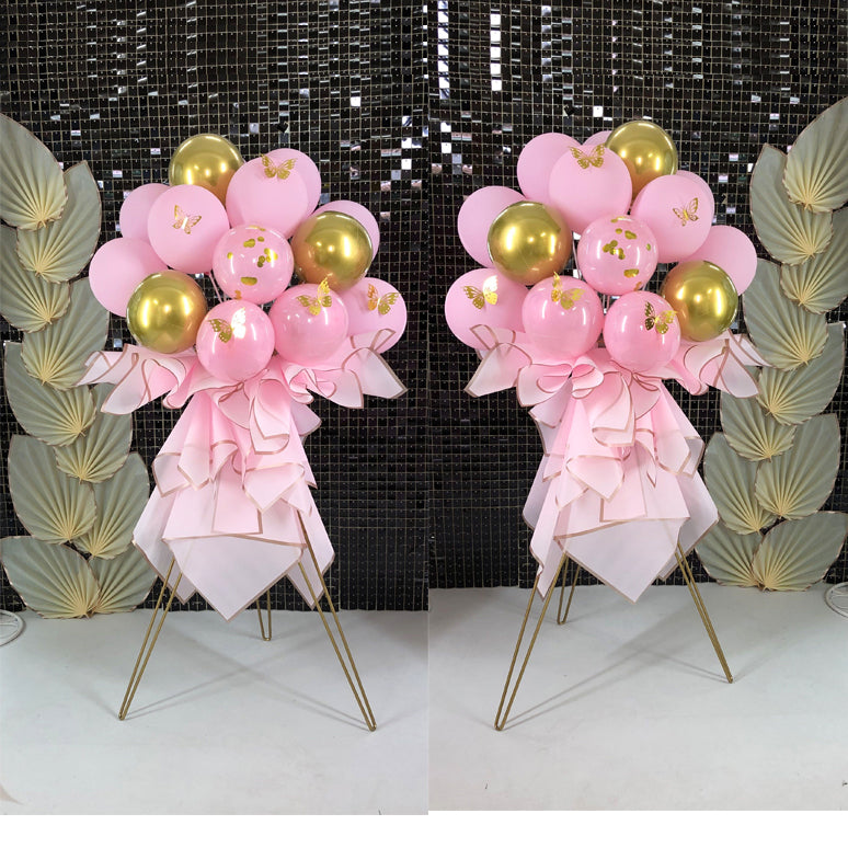 Creative pink balloon stand bouquet for a baby shower